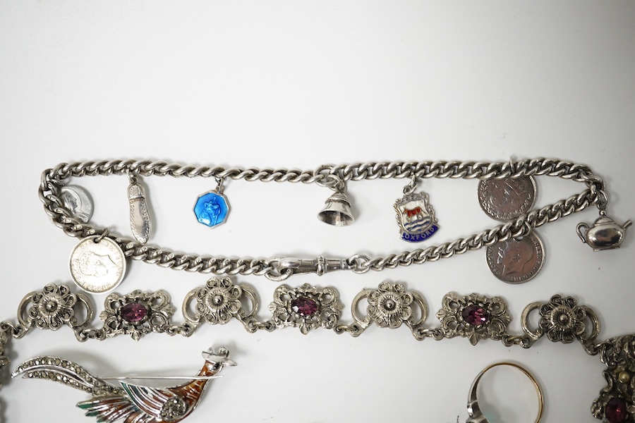 A small quantity of assorted jewellery including a silver charm bracelet, amethyst paste necklace, agate bead necklace and three marcasite set items, etc. Condition - poor to fair to good